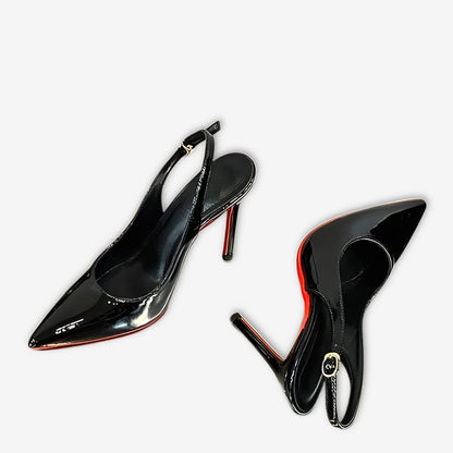 Vespera – L’audace vernie à semelle rouge