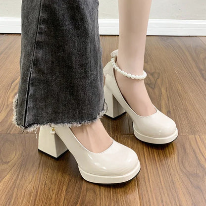 Perlina – Mary Janes vernies à bride perles et nœud satiné