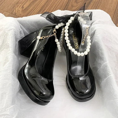 Perlina – Mary Janes vernies à bride perles et nœud satiné
